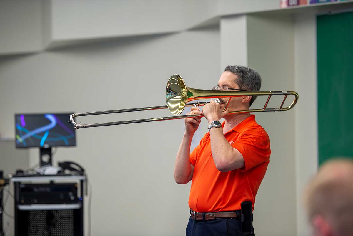 Tony Garcia demonstrating trombone techniques during his clinic.