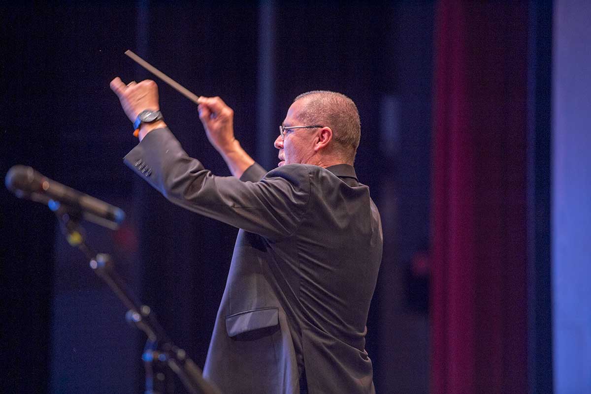 Richard Saucedo conducting during the opening concert of the Conn-Selmer Institute.